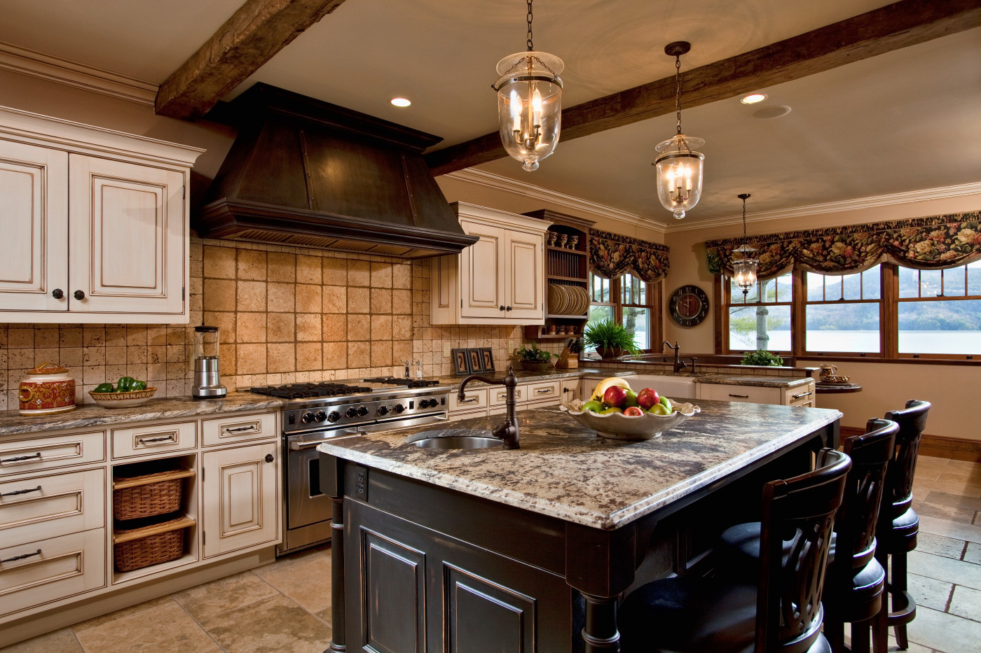 This wooden hood was faux finished to look like metal by Teakwood Builders, kitchen and bath remodeler, custom home builder and general contractor Saratoga Springs and Capital Region