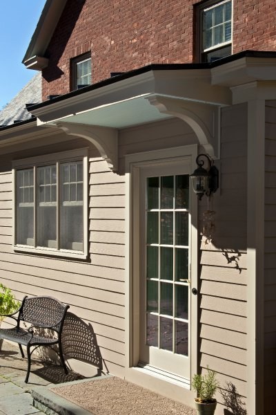 This historic Albany home’s new addition by Teakwood Buiders features a covered back entry.