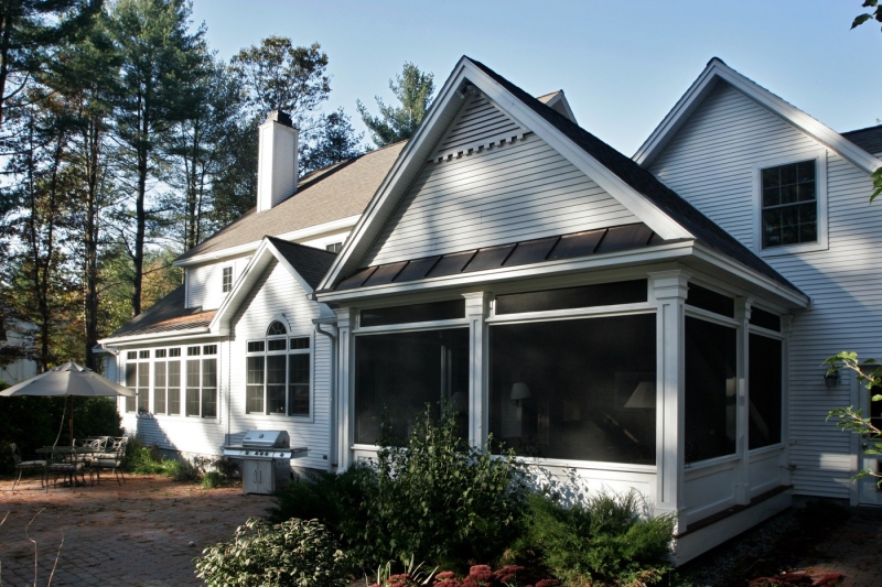 Teakwood Builders removed the back of this Saratoga Springs home to expand the family room and add a breakfast nook and screened porch, with the new construction married seamlessly to the original structure.