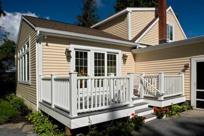 Teakwood helped reinvent this 1950s bungalow in Saratoga Springs with an addition that included a back porch, dining area and family room.