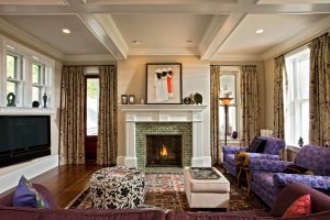 The mantel and fluted legs for this fireplace were customized to mimic existing molding profiles found throughout this 1873 home. Teakwood Builders, kitchen and bath remodeler, custom home builder and general contractor Saratoga Springs and Capital Region