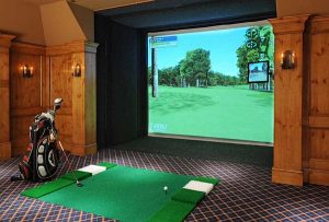 Home Game Rooms: custom millwork gives a rich feeling to a dominant electronic feature, such as a video golf course. via Homedit Interior Design and Architecture