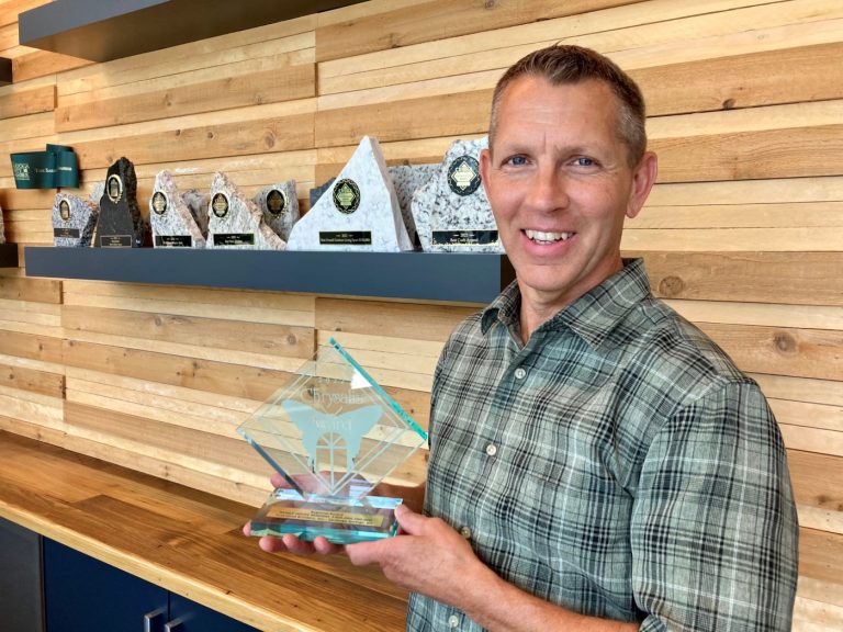 Thad Smith with the 2022 Chrysalis Award for Ranch Reclaimed