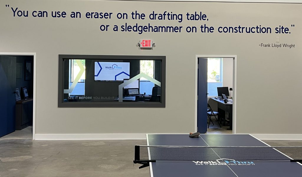 view of office with quote on wall
